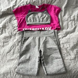 Gymshark- High rise leggings, Strappy sports bra and cropped shirt.